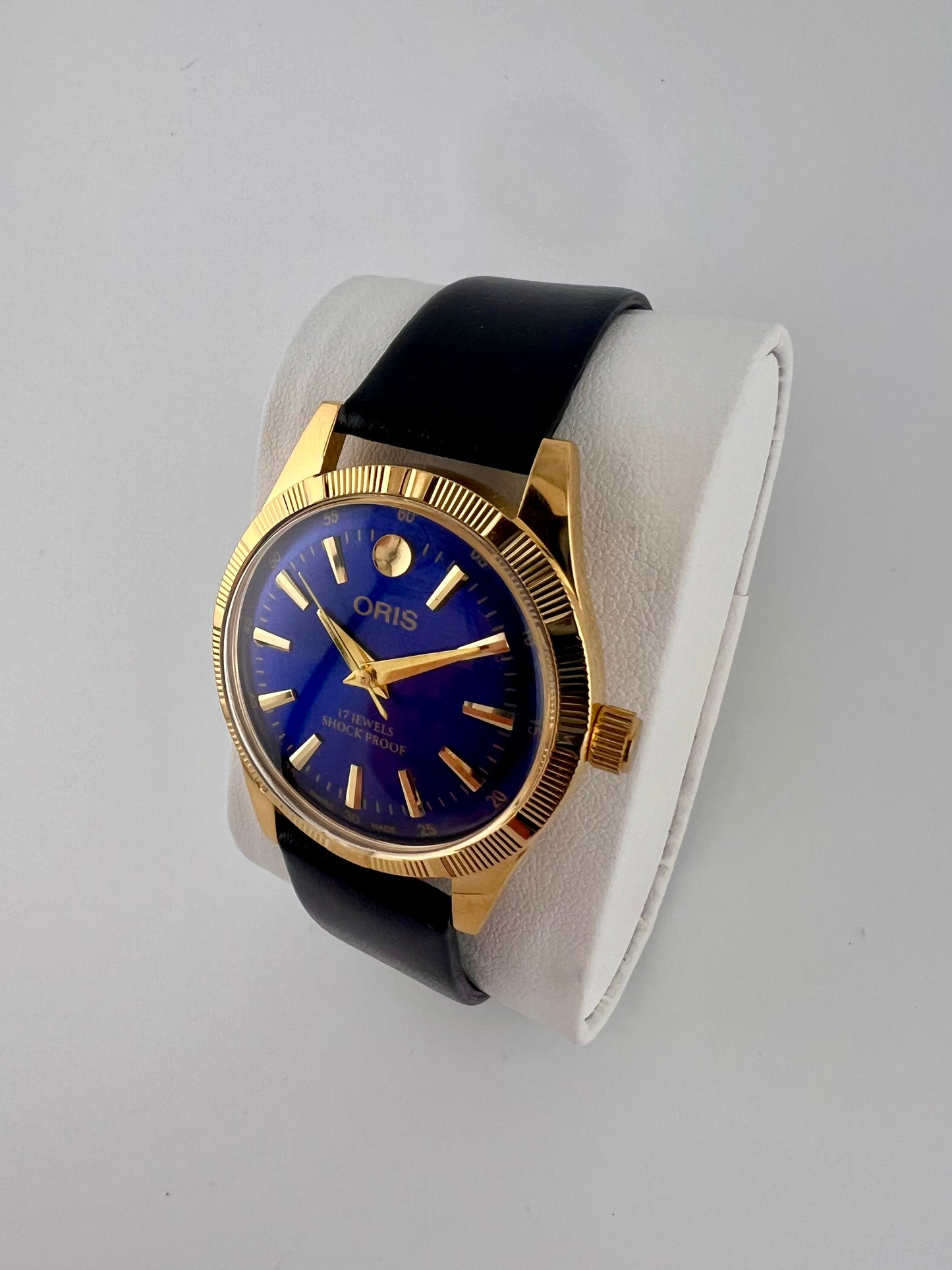 Vintage Oris blue gold dial Swiss watch — side shot — PAWL Studio