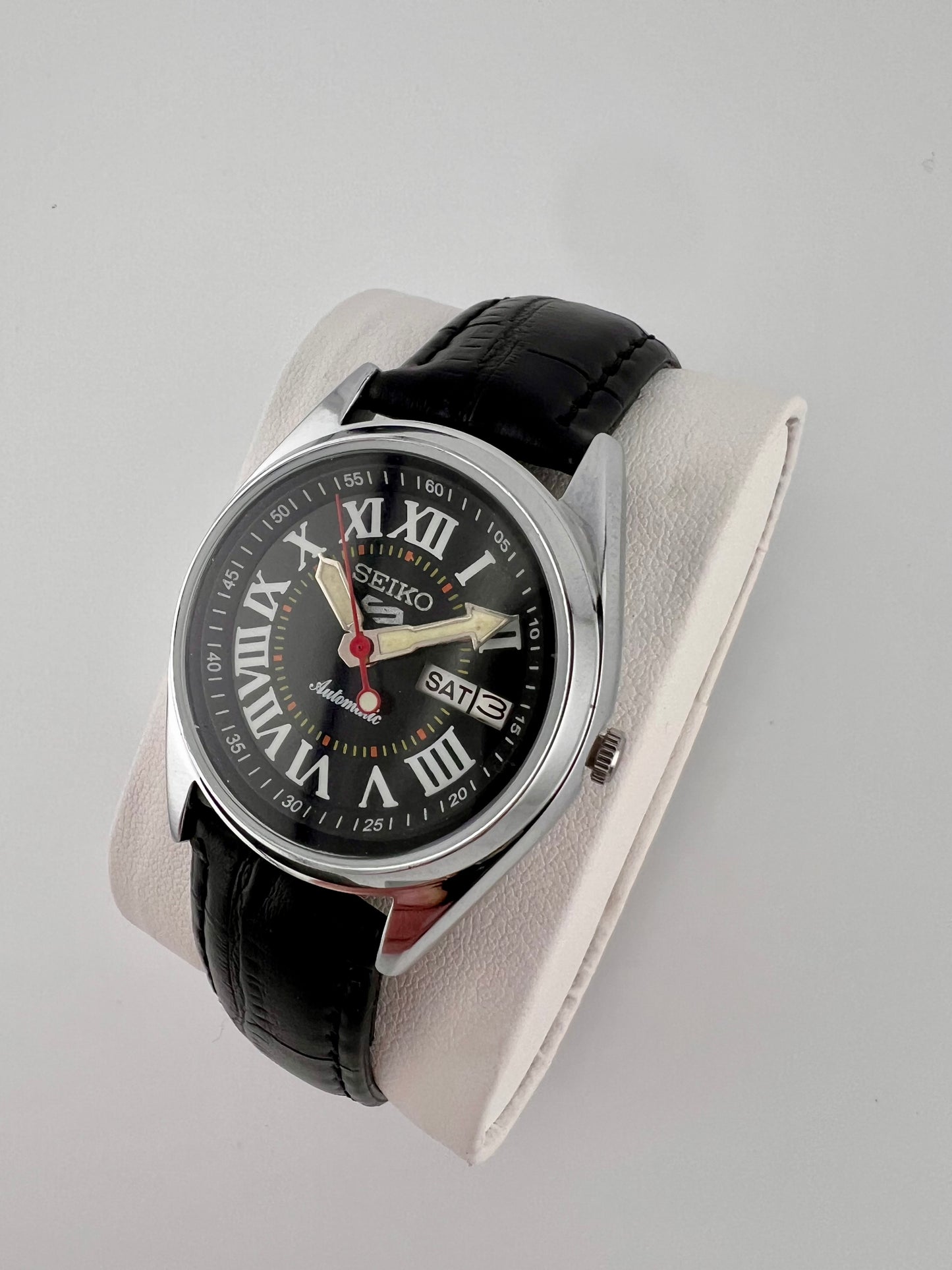 Vintage Seiko black Roman dial watch — side shot — PAWL Studio
