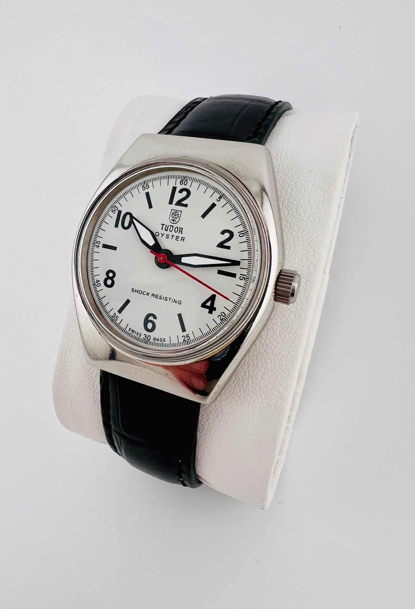 Vintage Tudor white dial Swiss watch — side shot — PAWL Studio