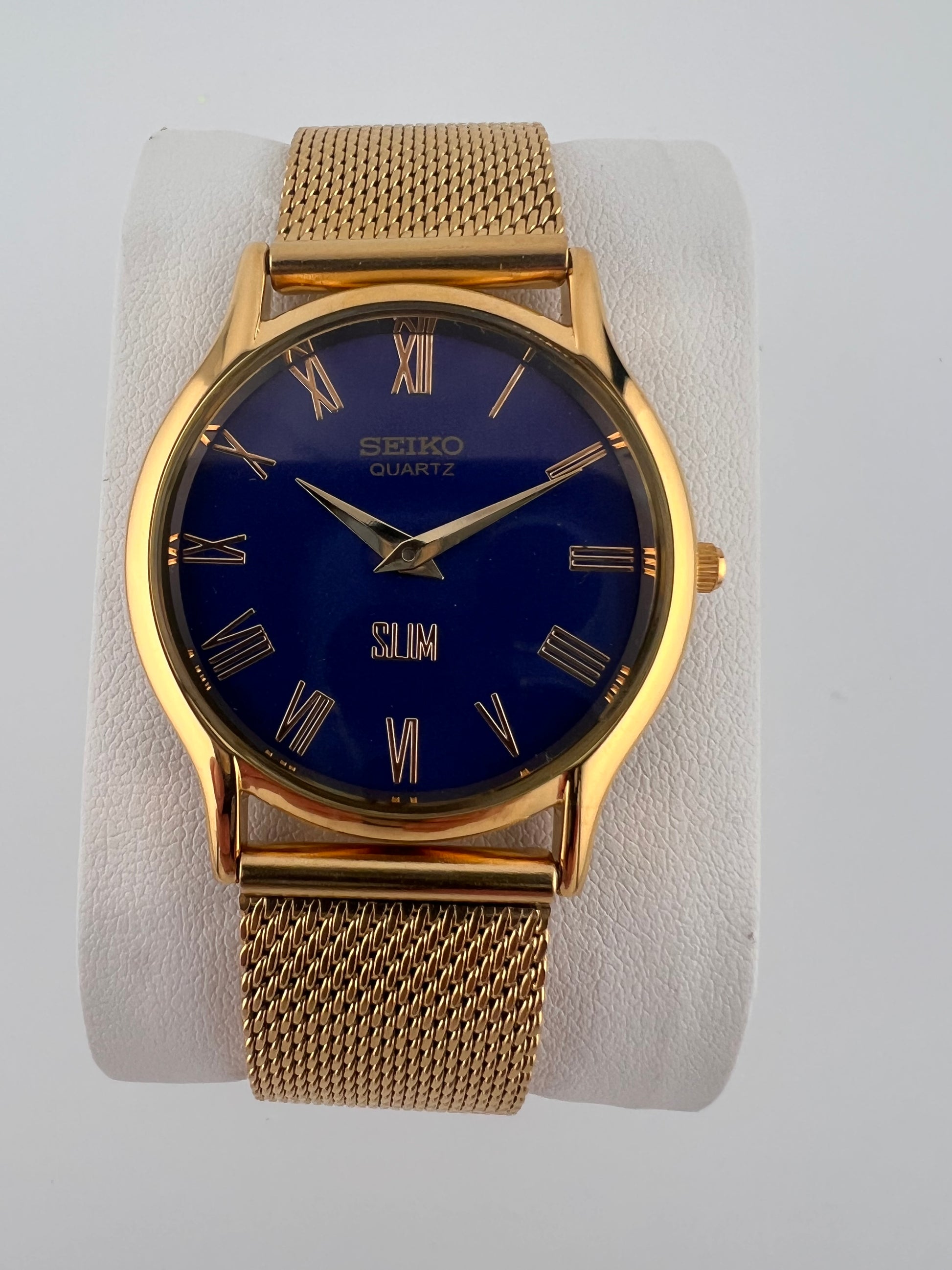 Vintage Seiko quartz blue gold dial watch — life shot — PAWL Studio