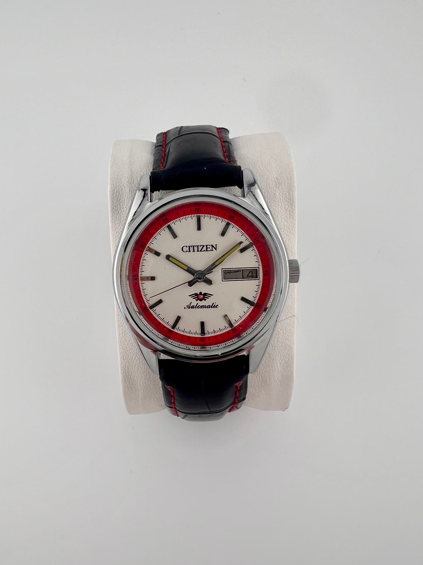 Vintage Citizen automatic white red day-date watch — life shot — PAWL Studio