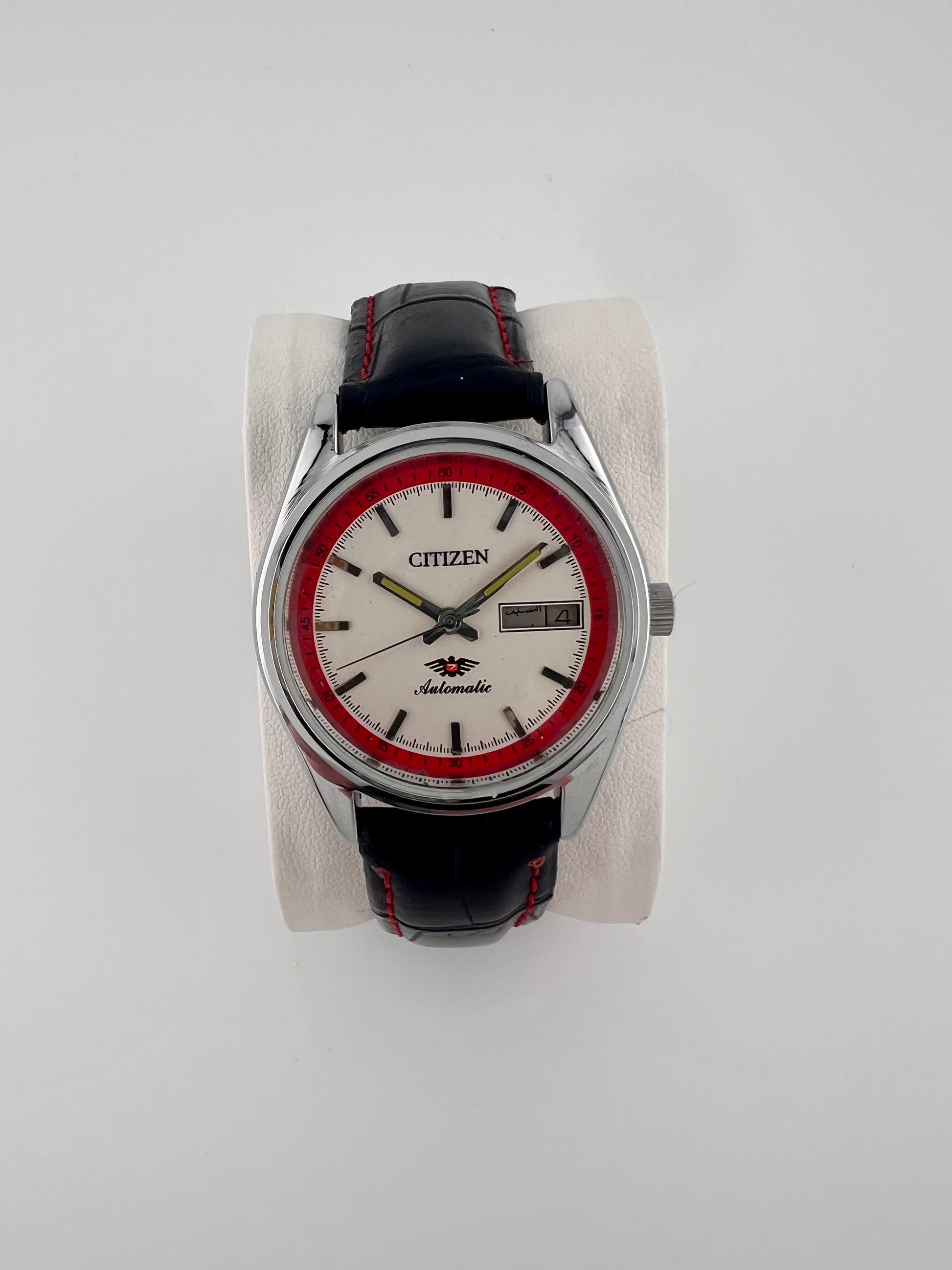 Vintage Citizen automatic white red day-date watch — life shot — PAWL Studio
