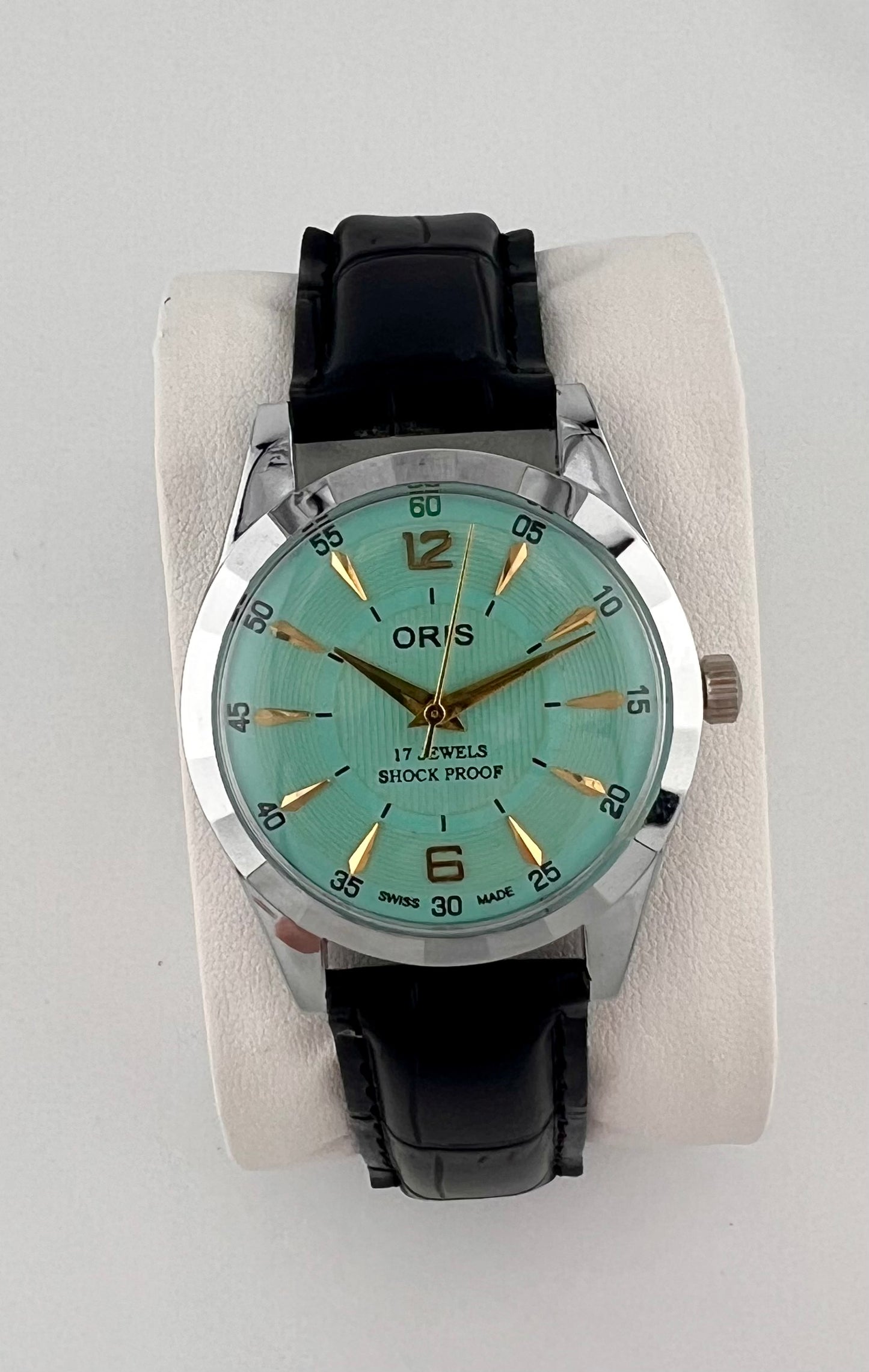 Vintage Oris duck egg green dial Swiss watch — life shot — PAWL Studio