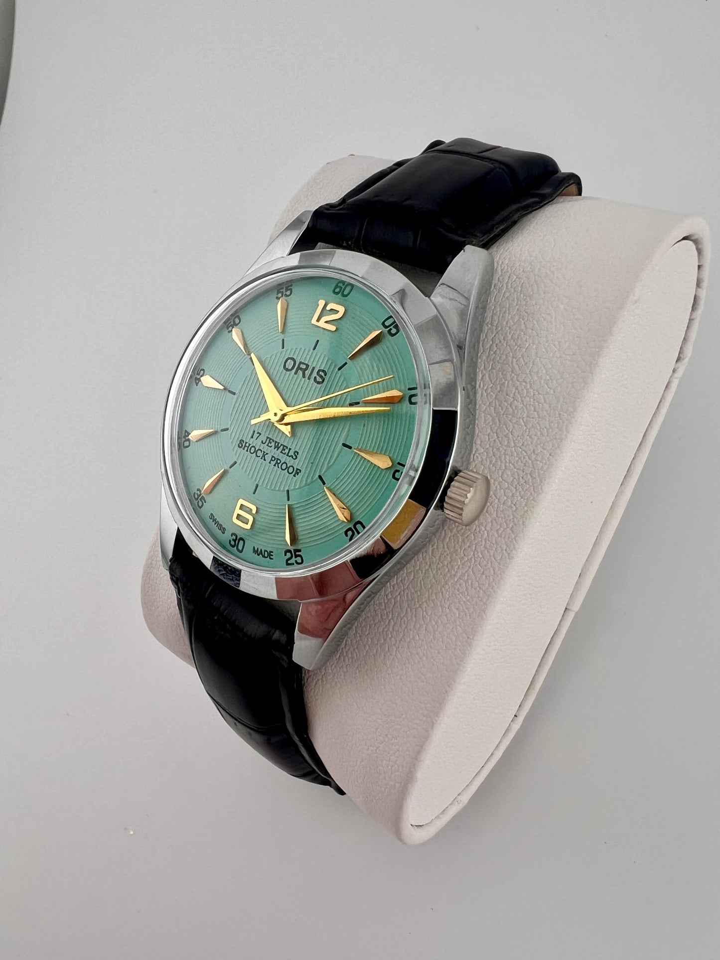 Vintage Oris duck egg green dial Swiss watch — side shot — PAWL Studio