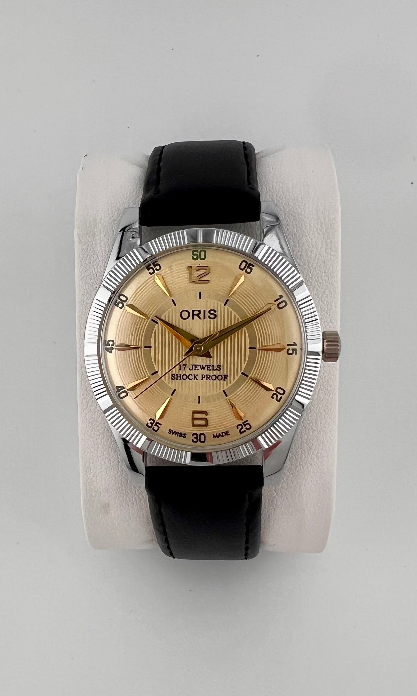 Vintage Oris gold dial Swiss watch — life shot — PAWL Studio