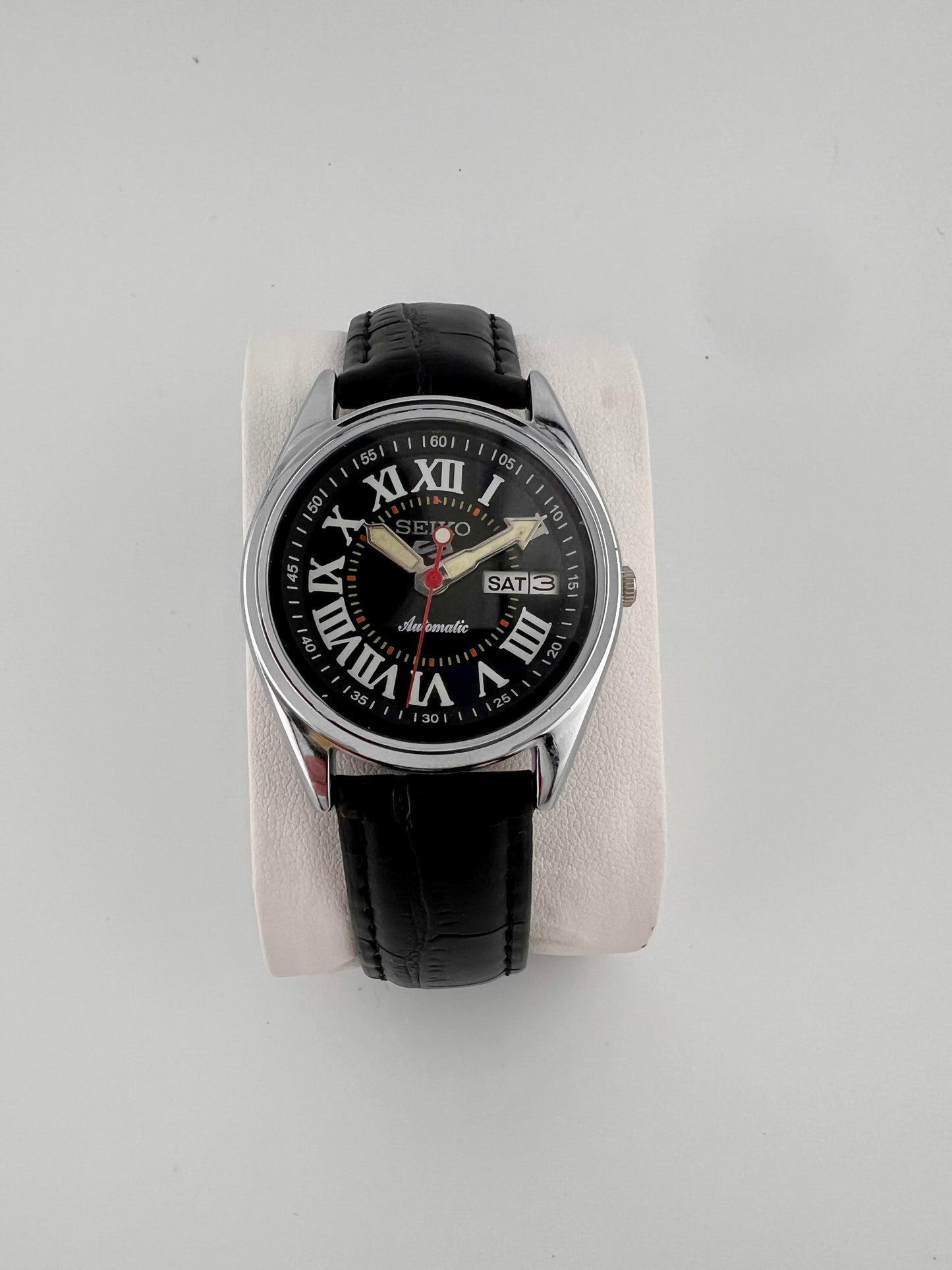 Vintage Seiko black Roman dial watch — life shot — PAWL Studio