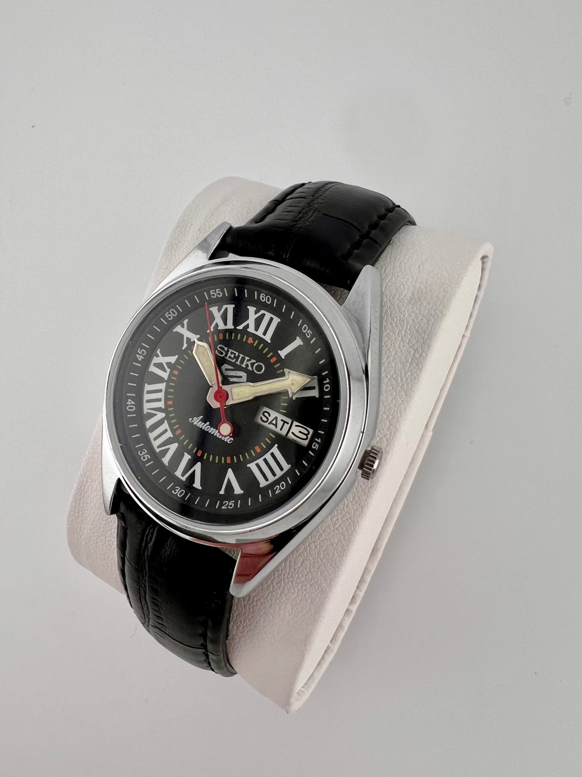 Vintage Seiko black Roman dial watch — side shot — PAWL Studio
