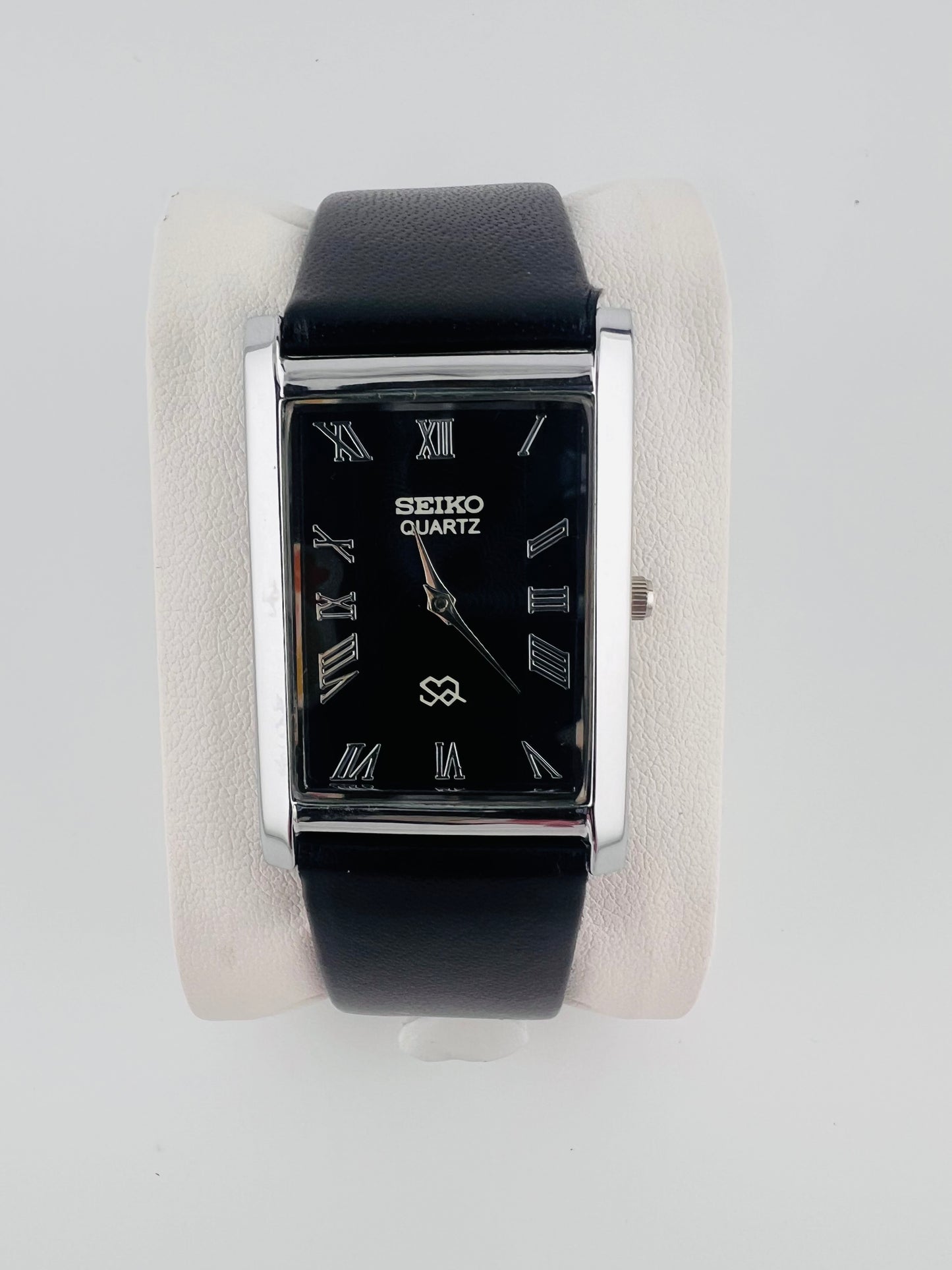 Vintage_Seiko_quartz_black_Roman_dial_watch_life_shot_2_PAWL_Studio