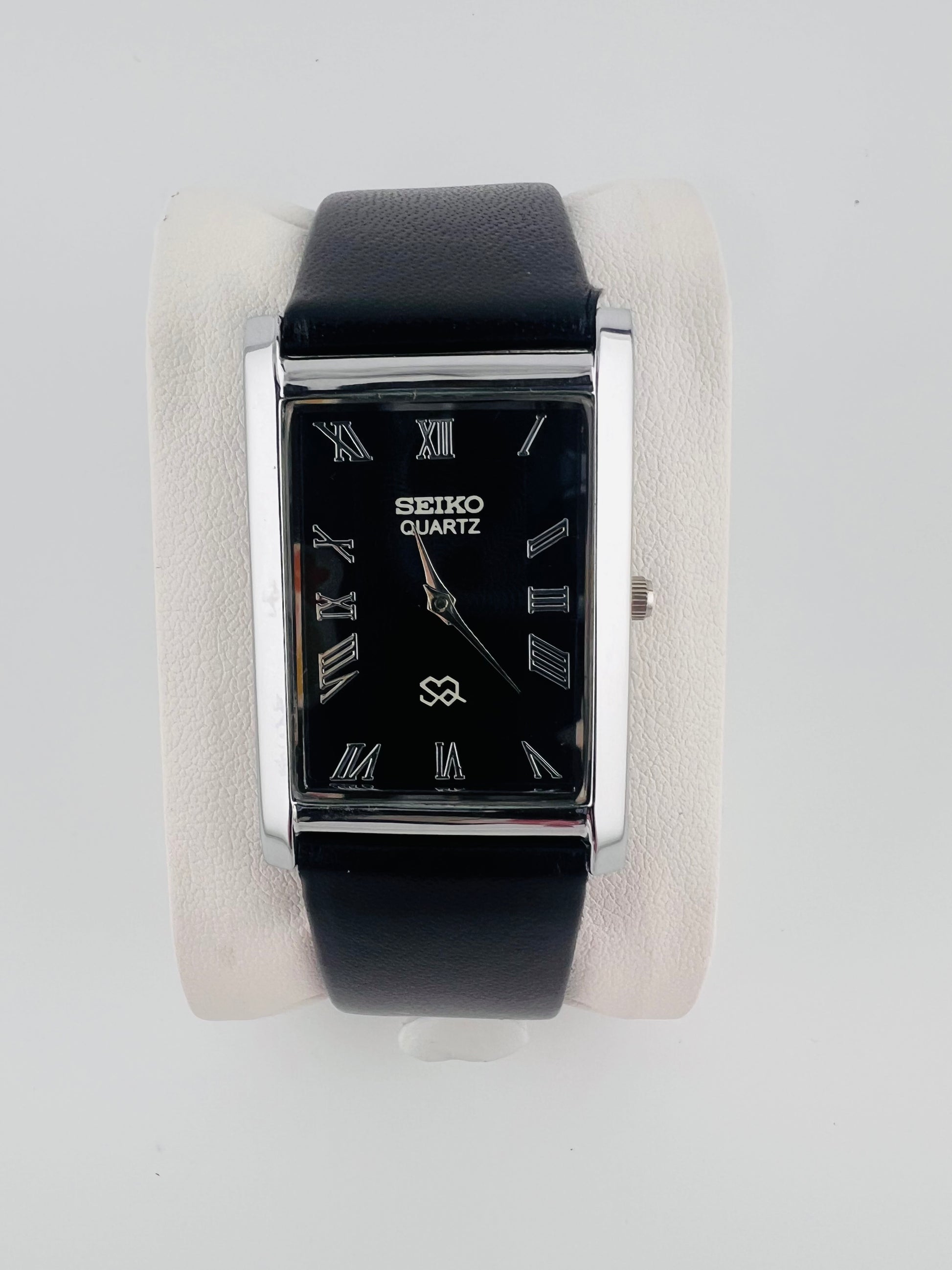 Vintage_Seiko_quartz_black_Roman_dial_watch_life_shot_2_PAWL_Studio