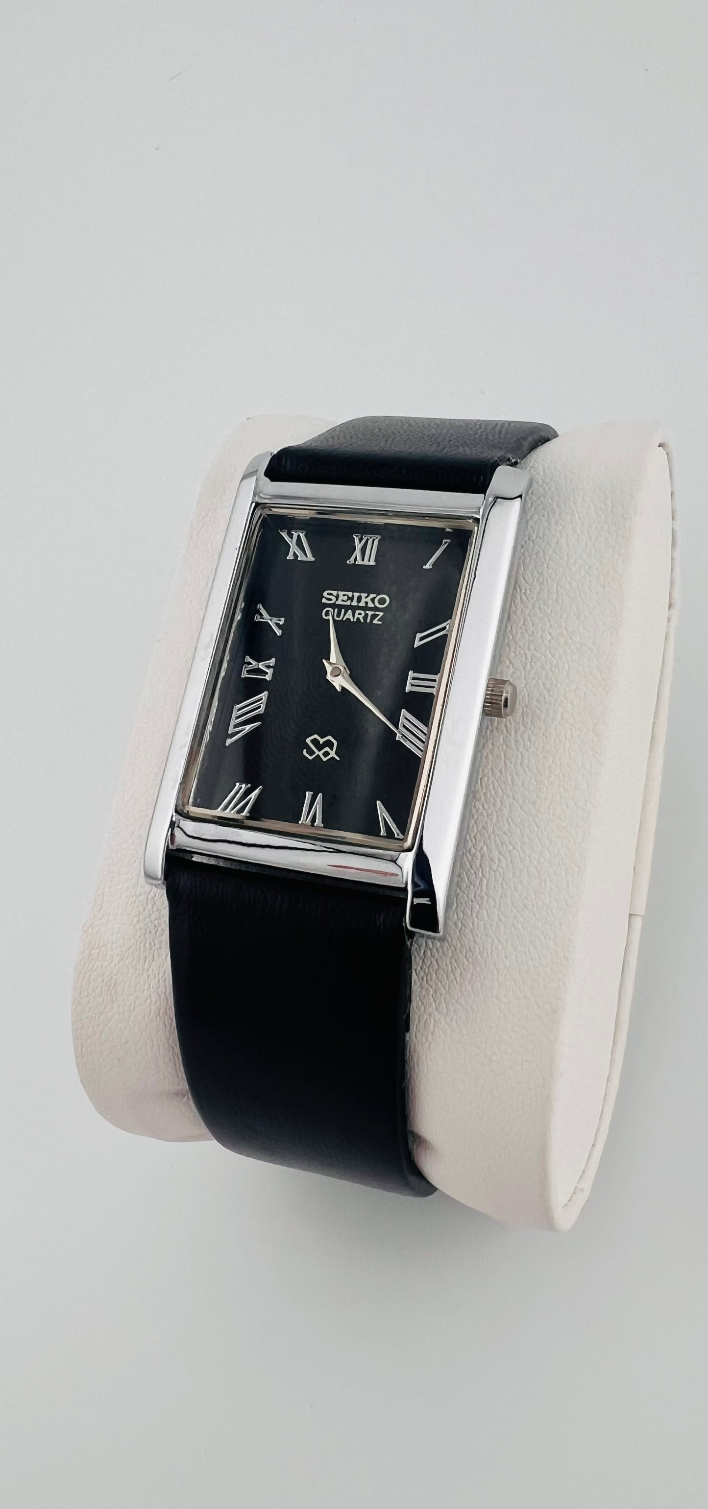 Vintage_Seiko_quartz_black_Roman_dial_watch_side_shot_2_PAWL_Studio
