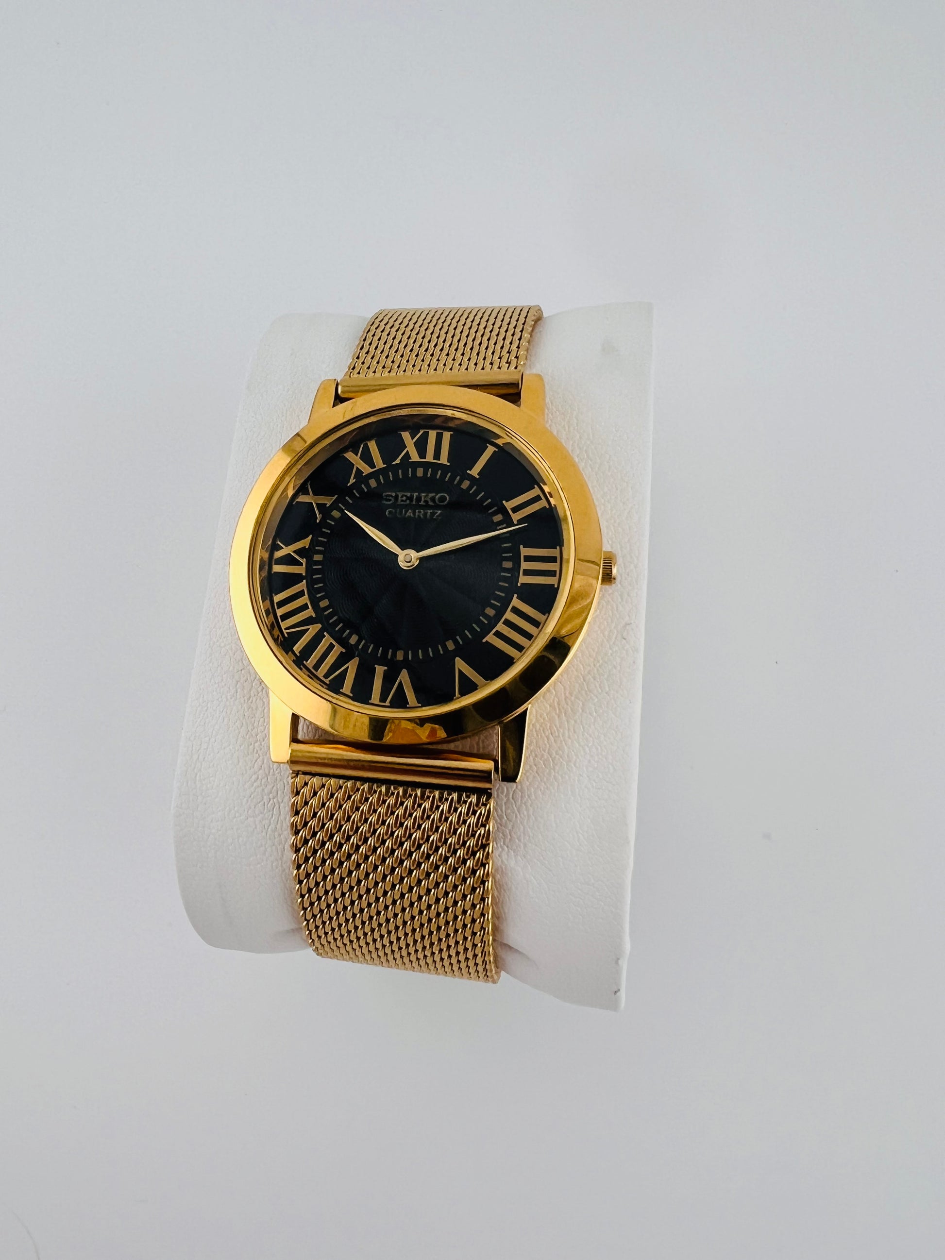 Vintage Seiko quartz black Roman dial watch — side shot — PAWL Studio