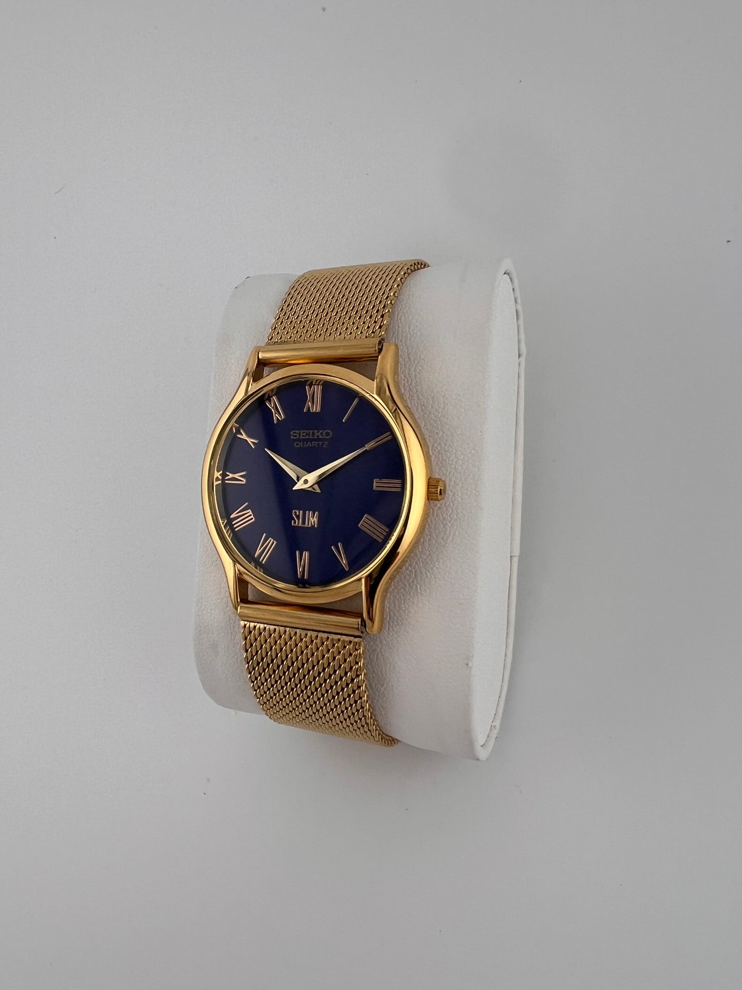 Vintage Seiko quartz blue gold dial watch — side shot — PAWL Studio