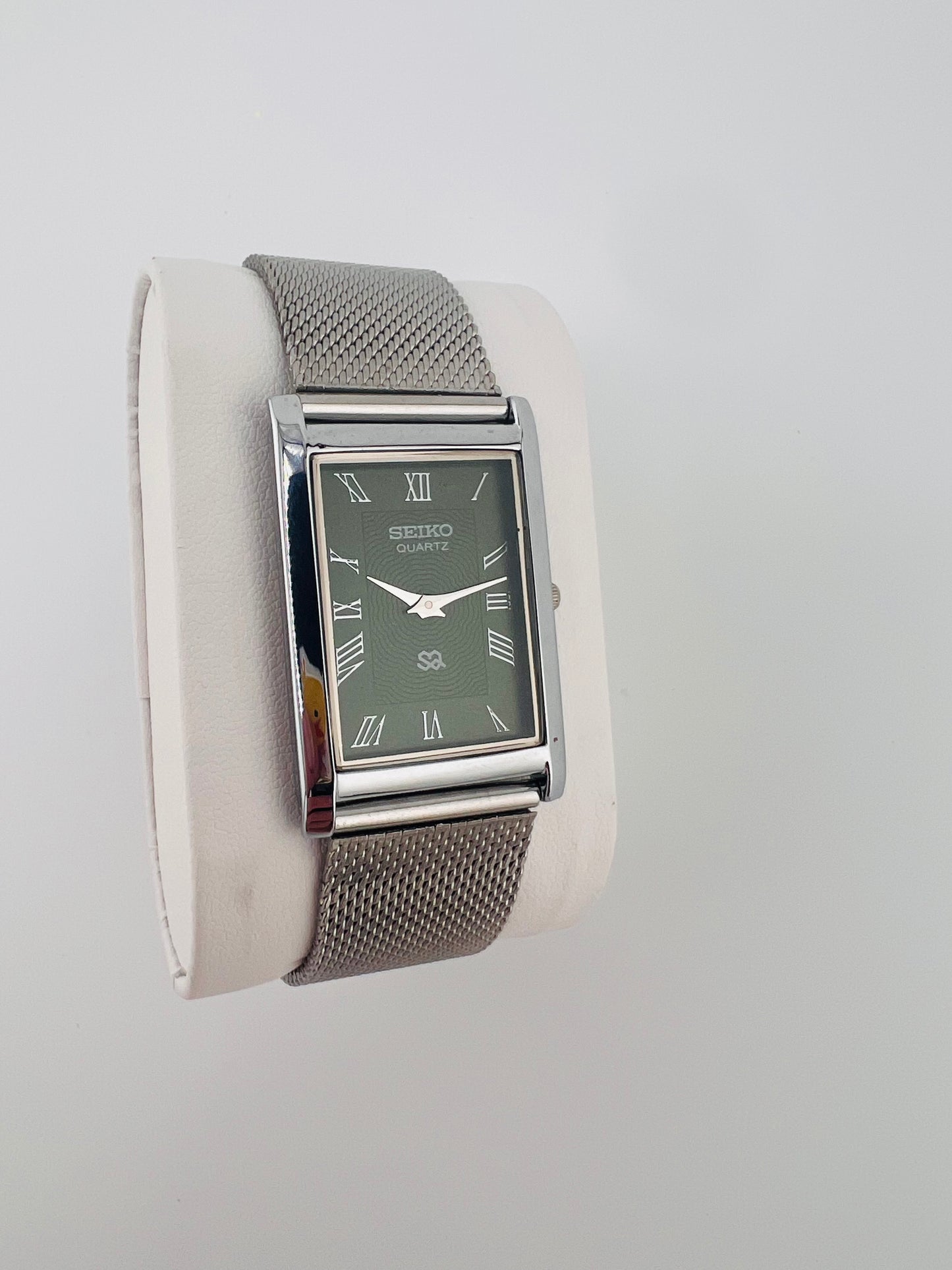 Vintage Seiko quartz green Roman dial watch — life shot — PAWL Studio