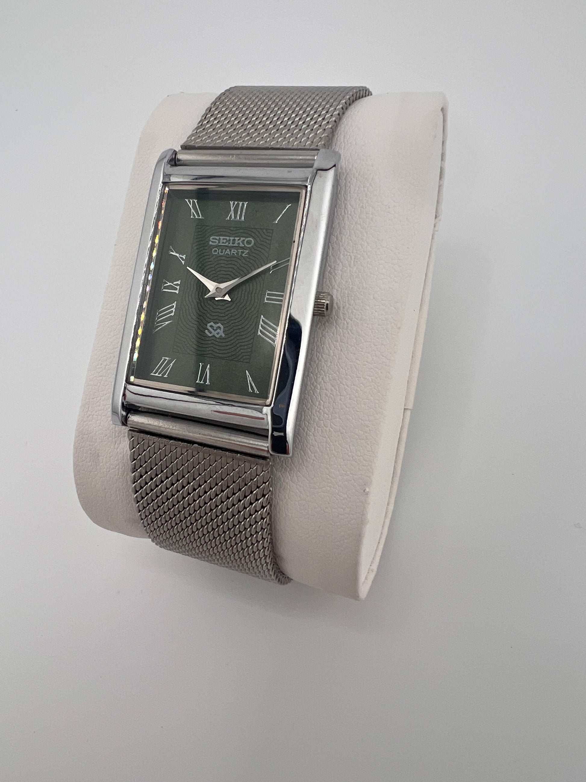 Vintage Seiko quartz green Roman dial watch — side shot — PAWL Studio