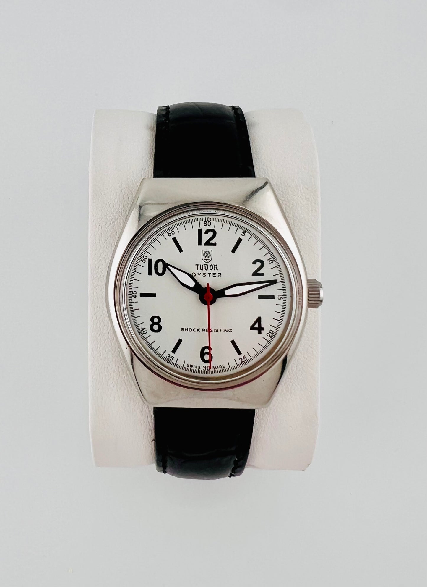 Vintage Tudor white dial Swiss watch — life shot — PAWL Studio