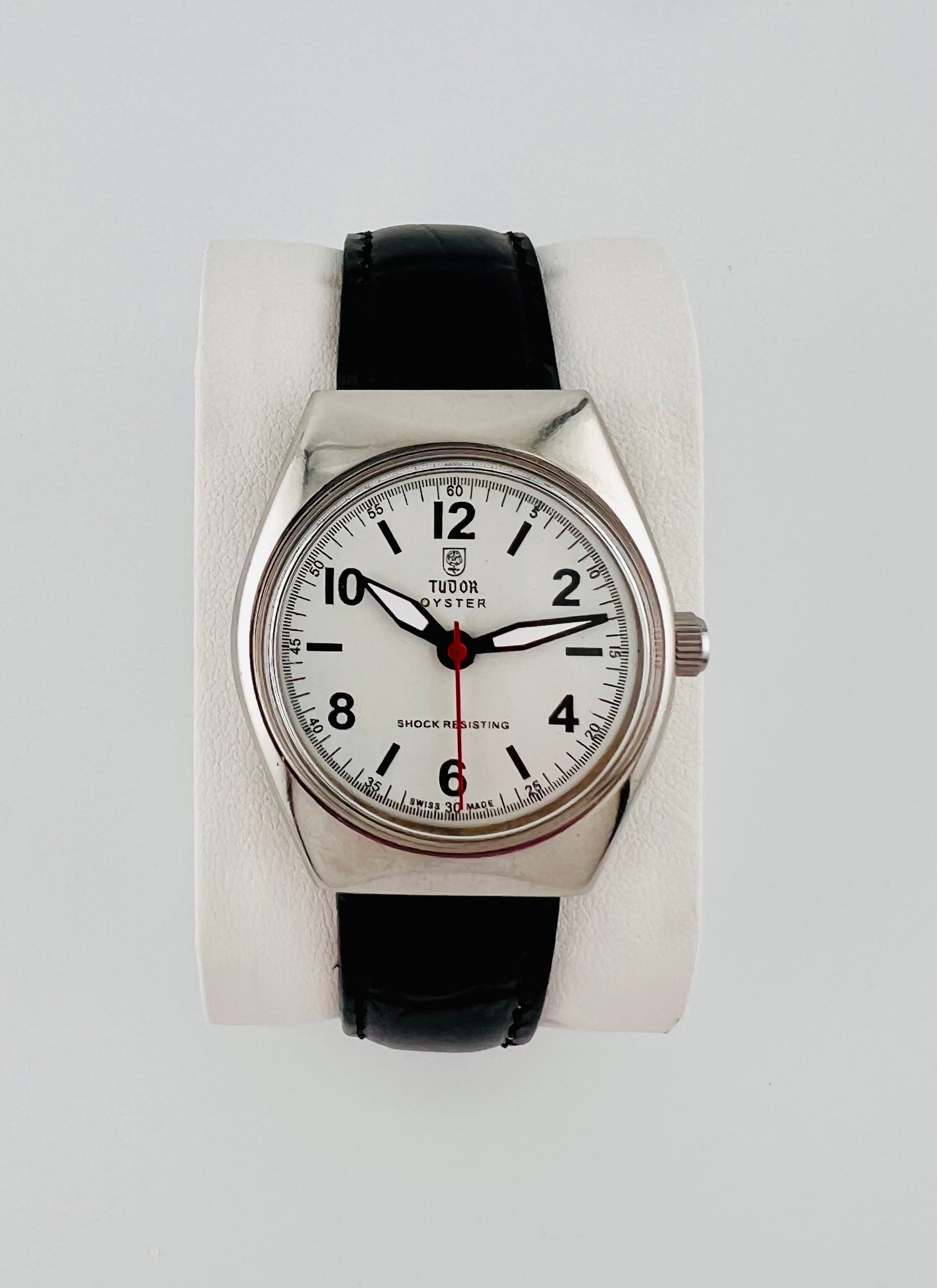 Vintage Tudor white dial Swiss watch — life shot — PAWL Studio