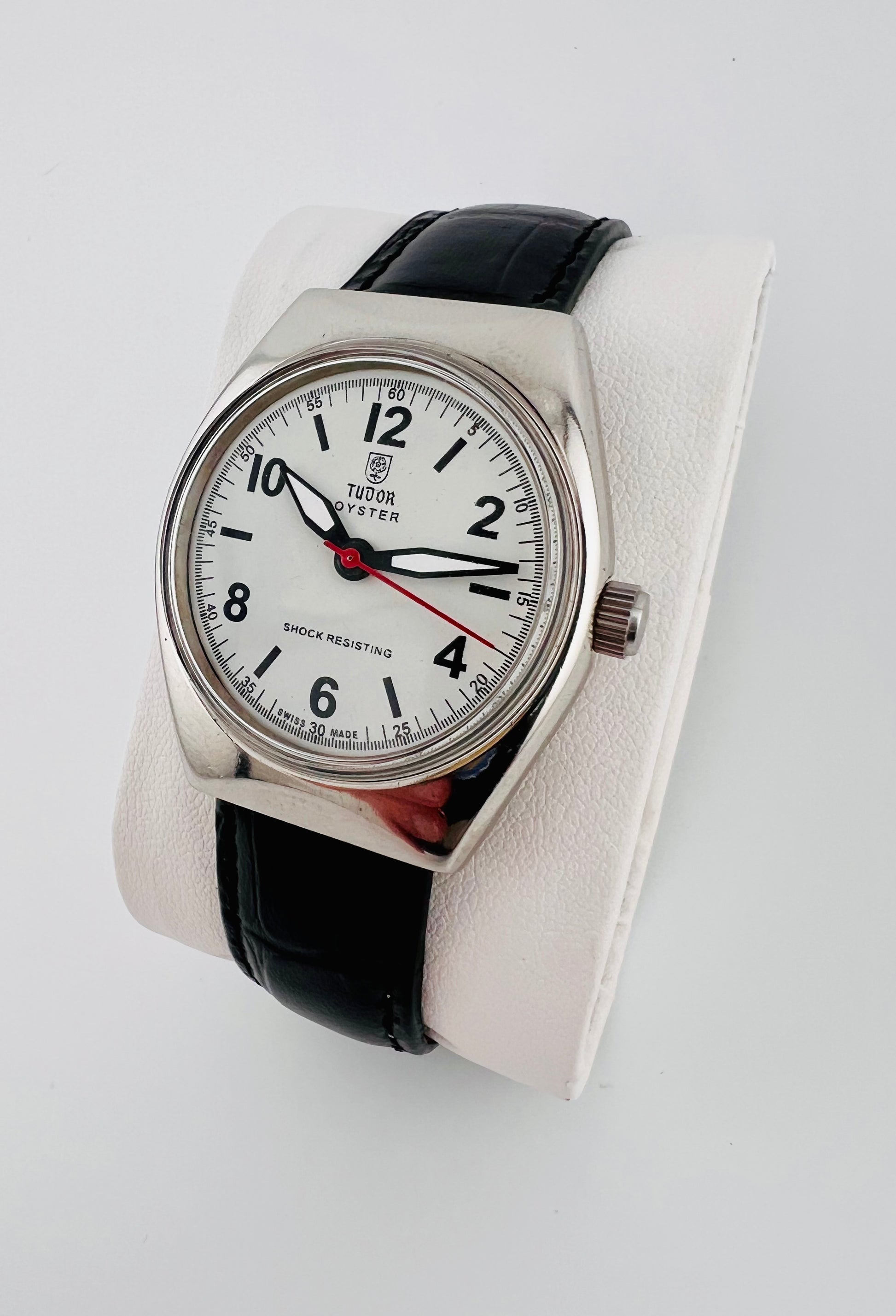Vintage Tudor white dial Swiss watch — side shot — PAWL Studio